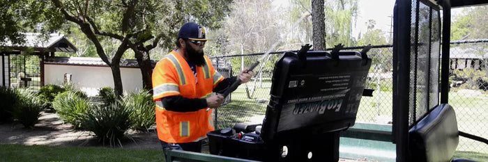 City of Glendale worker shows the portable pressure washer EcoBlaster