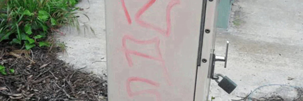 removing graffiti from painted or coated surface