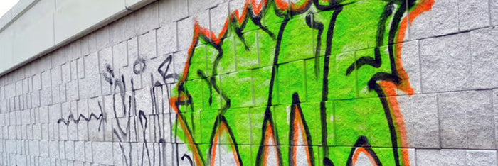 Removing Graffiti Tags and Paint from Concrete Block Wall