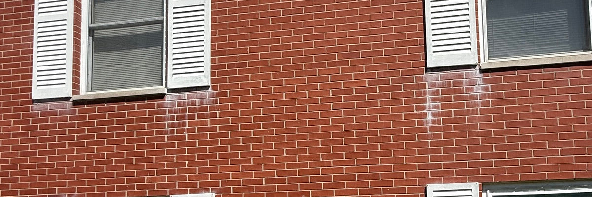 How to Remove Titanium Dioxide Paint Stains From Brick & Masonry