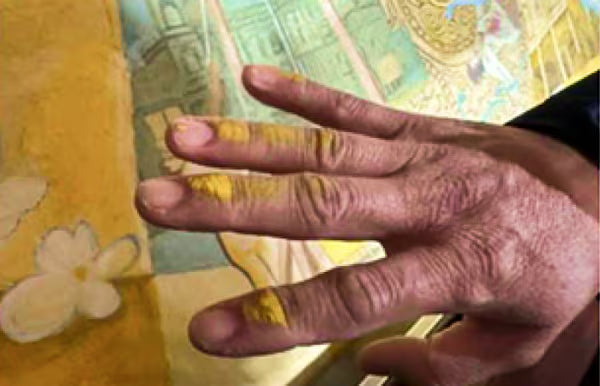 
Before protection, pigment could transfer from the mural surface during normal contact and maintenance.