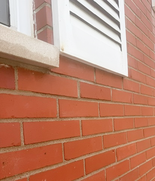 How to Remove Titanium Dioxide Paint Stains From Brick & Masonry