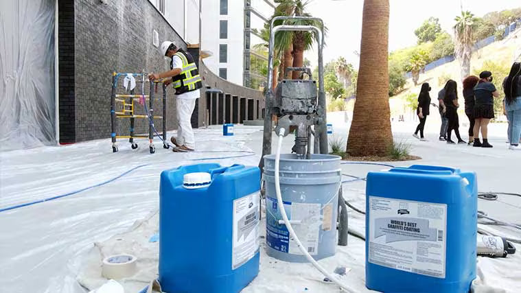 Getting ready to apply anti-graffiti coating