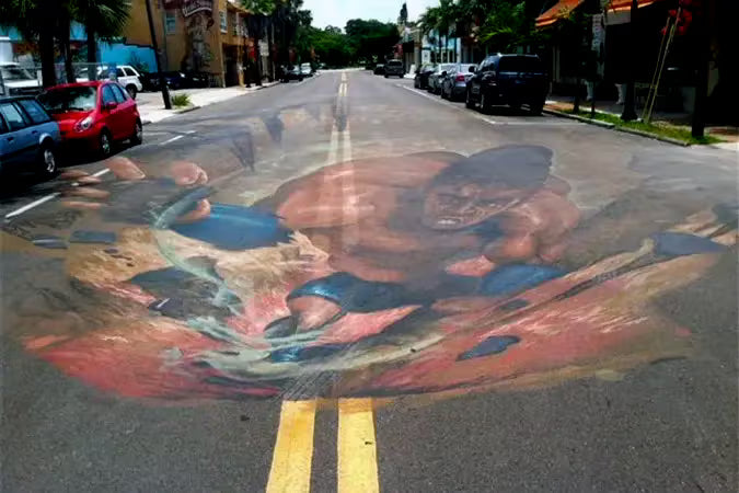 
Painted mural on asphalt may be best removed with Vanish