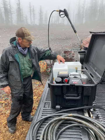 
Man with Portable Pressure Washer