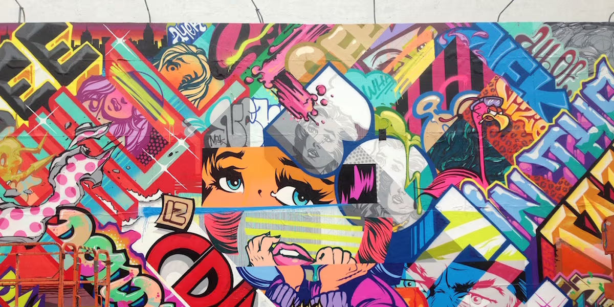Collaborative mural painted by Pose with Revok 